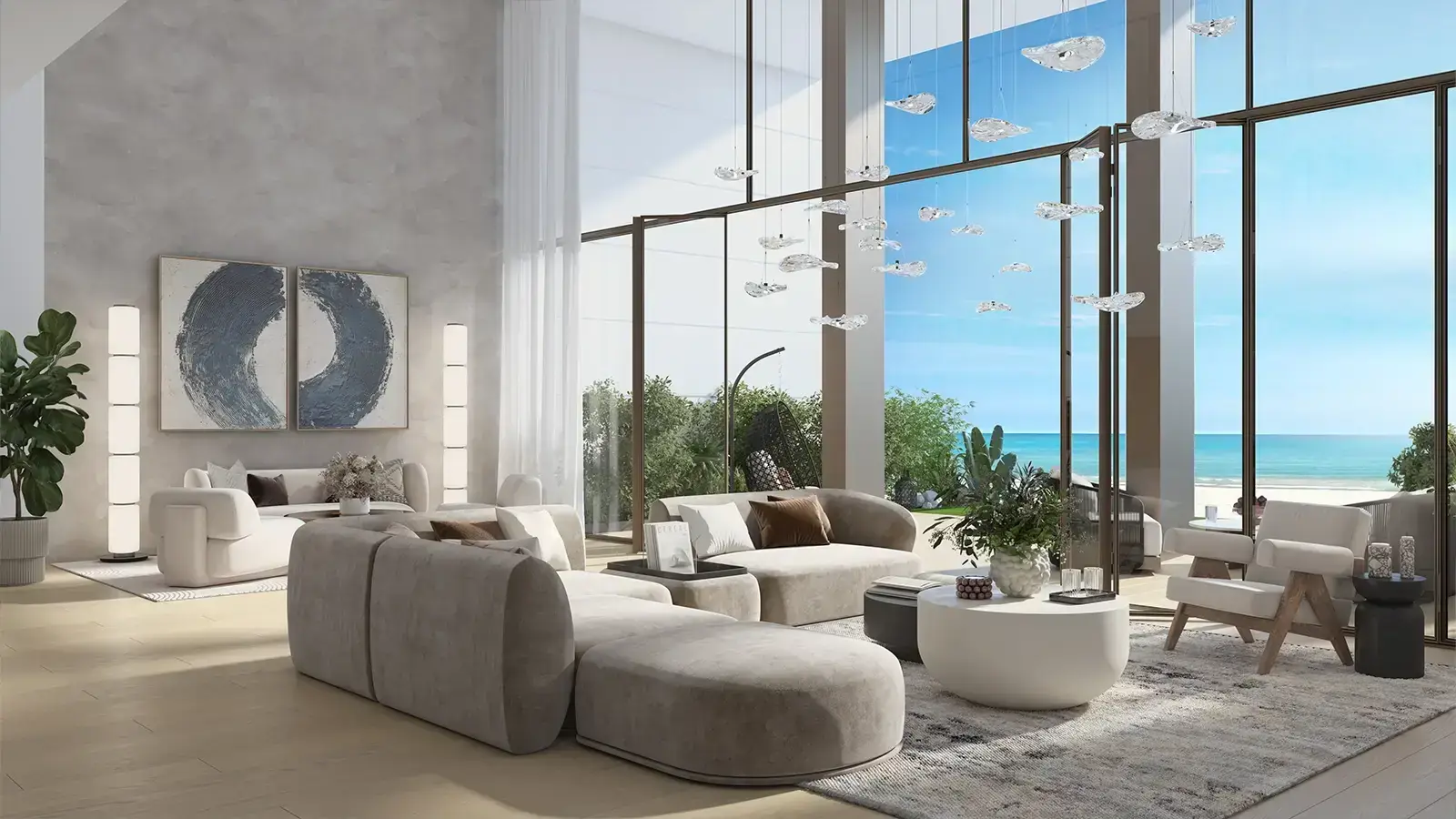 Beach House – double-height living room with floor-to-ceiling glazing facing the sea