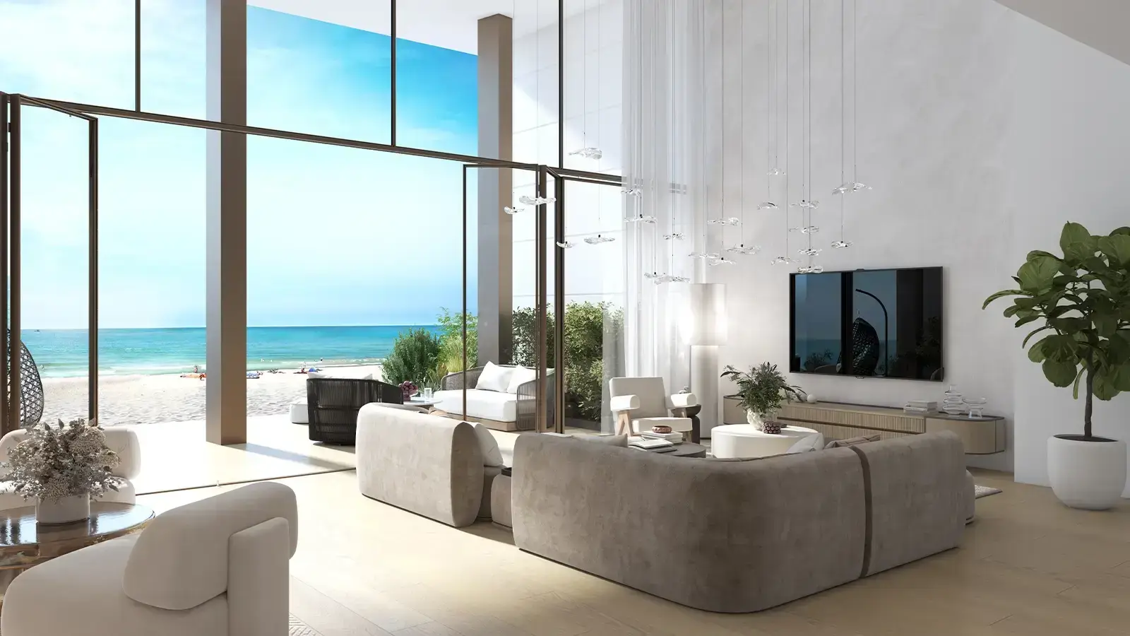 Beach House – living room with TV wall and tall glass doors opening onto the beach