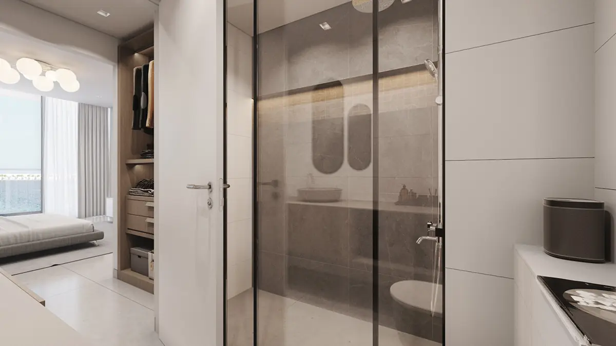 Gateway Residences II – glass shower beside a bedroom with walk-in wardrobe