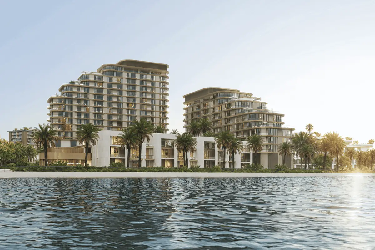 Mirasol II – terraced residential buildings and palm trees seen across the water