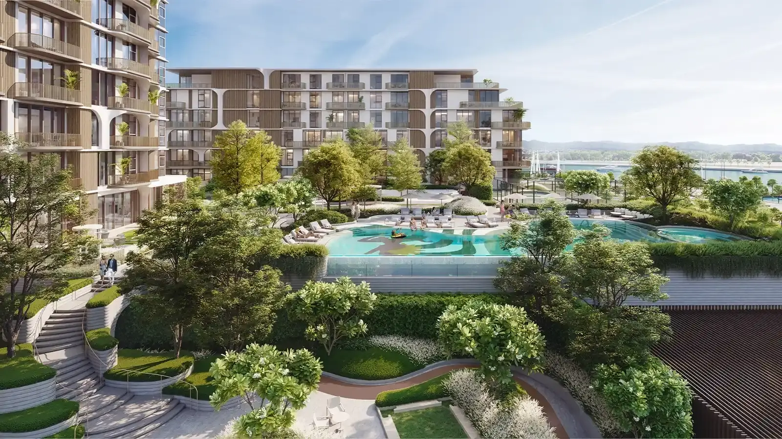 Nura – podium pool deck surrounded by trees and terraced gardens