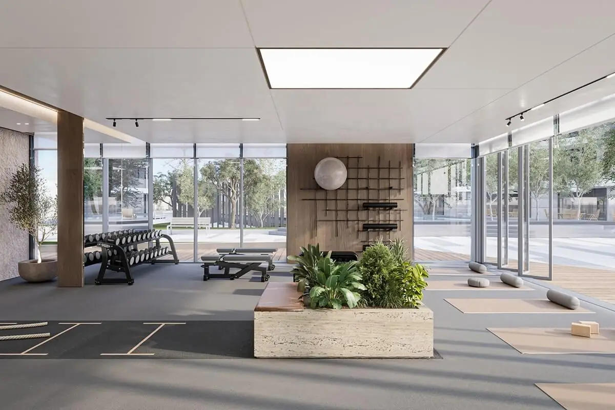SKAI – gym and studio with free weights, planter and full-height glazing